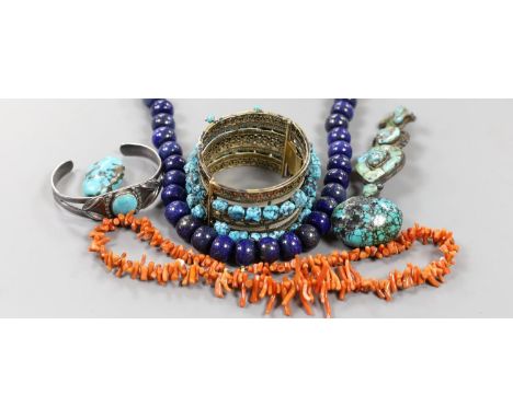 A lapis lazuli necklace, 48cm, a coral necklace and a group of turquoise set jewellery, including a gilt white metal two row 