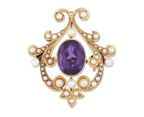 A LATE 19TH CENTURY AMETHYST AND SEED PEARL BROOCH an oval-cut amethyst within a scrolling seed pearl frame. Unmarked, 3cm by