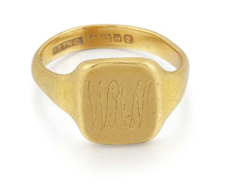 A 22 CARAT GOLD SIGNET RING monogrammed. Hallmarked Birmingham 1949, ring size R, 9.2 gramsThe shank is bent out of shape and