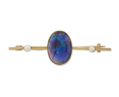 A BLACK OPAL AND SEED PEARL BAR BROOCH an oval black opal to a flat-sided bar set with two seed pearls. Marked '15CT', 1.5cm 