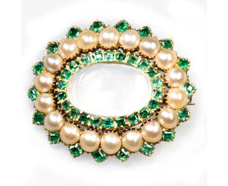 A LATE 19TH CENTURY MOONSTONE, EMERALD AND SPLIT PEARL BROOCH an oval moonstone within a border of emeralds and split pearls.