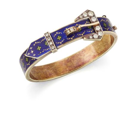 AN ANTIQUE STYLE 14 CARAT GOLD ENAMEL AND DIAMOND HINGE OPENING GARTER BANGLE filled with blue guilloché enamel and picked ou