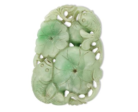 A JADE KOI CARP AND LOTUS CARVING depicting two koi carp fish swimming amongst lotus. 8.5cm by 6.2cmGood condition.