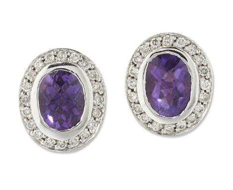 A PAIR OF AMETHYST AND DIAMOND CLUSTER EARRINGS oval checkerboard-cut amethysts within borders of round brilliant-cut diamond