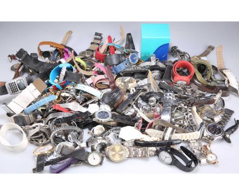 A LARGE QUANTITY OF FASHION WATCHES including vintage and modern examples, quartz and mechanical. (Qty)Varying conditions, ma