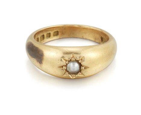 AN 18 CARAT GOLD PEARL RING a split pearl star-set to a tapering shank. Hallmarked London 1870, ring size M, 9.3 gramsLight g