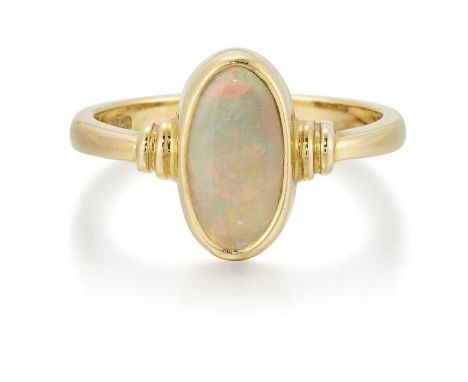 AN OPAL RING an oval opal to notched shoulders. Marked '18CT', ring size N1/2, 4.0 gramsGood condition. The opal measures 10.