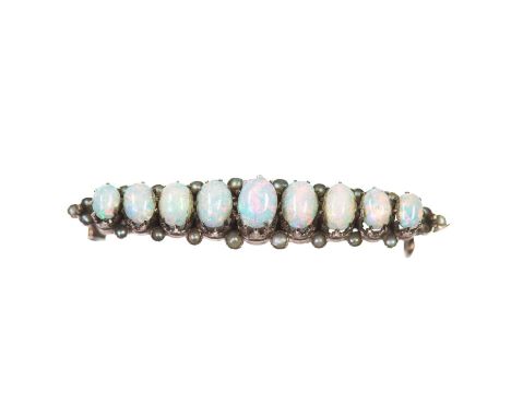 A LATE 19TH CENTURY OPAL AND SEED PEARL BROOCH graduated oval opals spaced by seed pearls. Marked '333', 4mm by 3.5cm, 2.7 gr