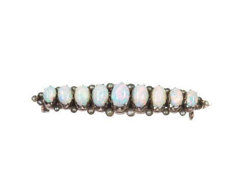 A LATE 19TH CENTURY OPAL AND SEED PEARL BROOCH graduated oval opals spaced by seed pearls. Marked '333', 4mm by 3.5cm, 2.7 gr