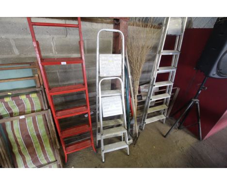 Two folding step ladders
