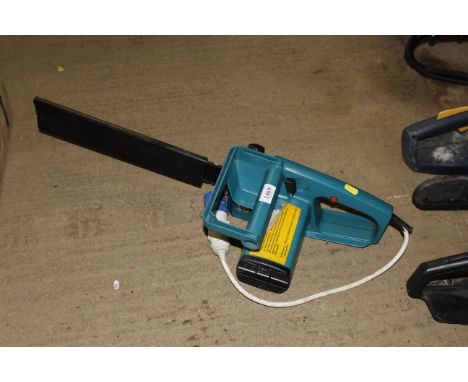 A Black & Decker electric chainsaw
