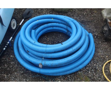 A quantity of perforated drainage pipe