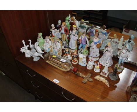 A collection of various ornaments to include Goebel, a ship-in-bottle ornament, three Lladro model geese etc.