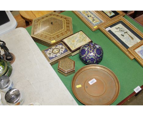 A collection of Eastern wooden inlaid trinket boxes and others together with a copper tray