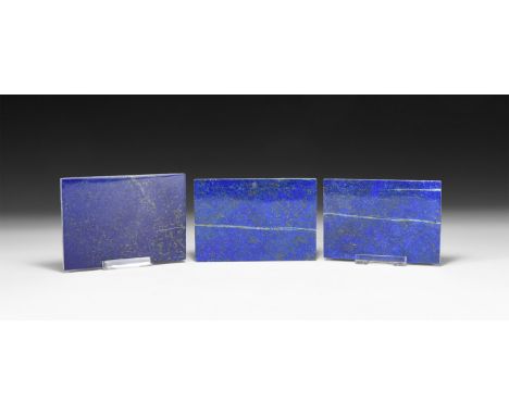 A group of three gem-quality, rectangular lapis lazuli plaques, polished on one side.  328 grams, 9.3-10cm (3 3/4 - 4"). From