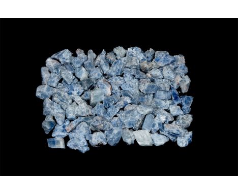 A group of a hundred blue calcite mineral specimens from Mexico.  1.6 kg, 20-39mm (3/4 - 1 1/2"). From a historic ‘Victorian 