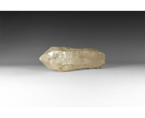 A very large, colourless quartz crystal with natural transparent to translucent faces.  3.17 kg, 25.5cm (10"). From a histori