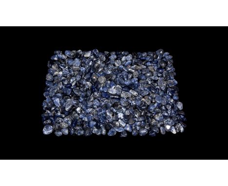 A group of four-hundred and forty-five cut and polished blue sodalite specimens.  1.01 kg total, 17-20mm (3/4"). From a histo