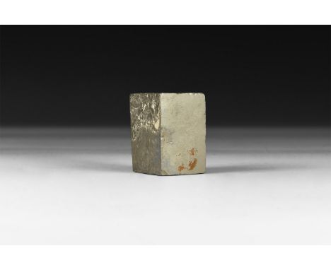 A finely formed pyrite 'cube' (Fool's gold) with lustrous surface, in white card tray.  95 grams, 35mm (1 1/4"). From a histo