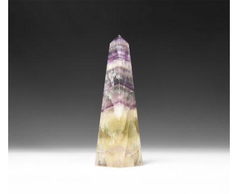 A cut and polished fluorite crystal obelisk with bands of green and purple colour.  240 grams, 13cm (5"). From a historic ‘Vi