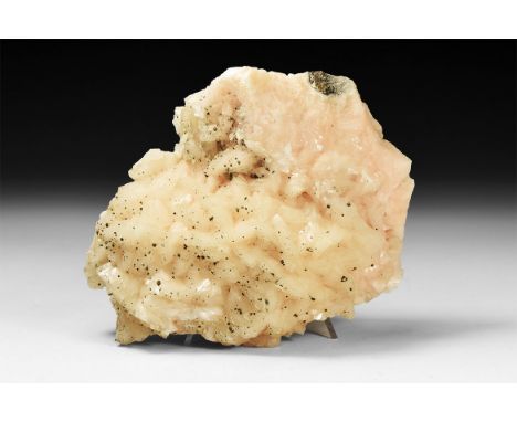 A well formed pale pink dolomite saddle-shaped crystal crust mass.  617 grams, 12.5cm (5"). From a historic ‘Victorian Museum