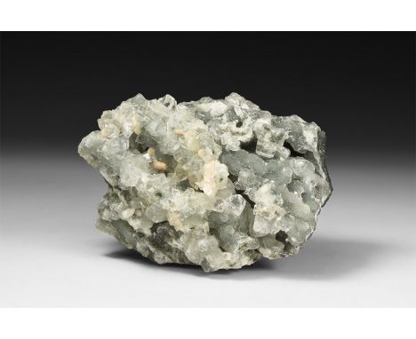 A fine specimen consisting of numerous colourless apophyllite crystals on a ground mass of another zeolite.  765 grams, 14cm 