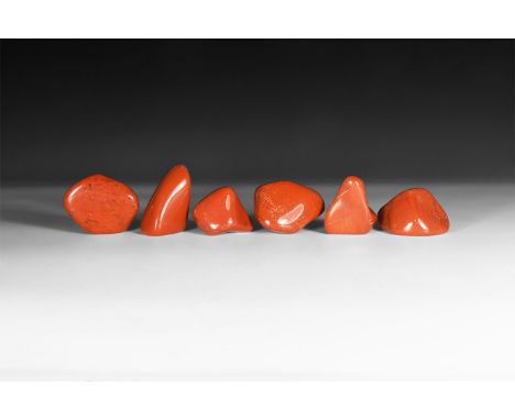 A group of six cut and polished deep red jasper specimens, each in white card tray with label reading: 'Red Jasper'.  378 gra