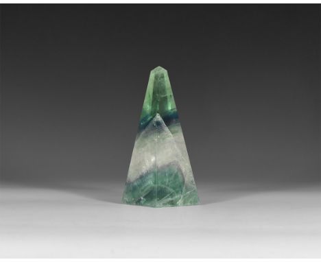 A cut and polished fluorite crystal with bands of green and white colour.  175 grams, 90mm (3 1/2"). From a historic ‘Victori