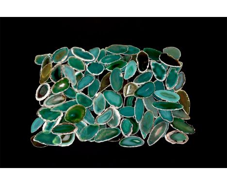 A group of one hundred cut and polished green agate slices, colour enhanced.  685 grams total, 34-60mm (1 1/4 - 2 1/4"). From
