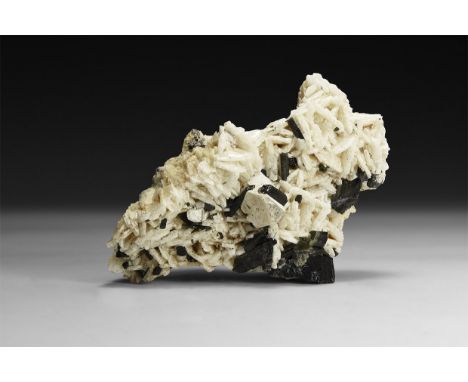 A specimen of quartz crystal with sphalerite inclusions.  306 grams, 12cm (4 3/4"). From a historic ‘Victorian Museum’ collec