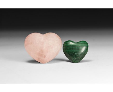 A group of finely cut and polished hearts comprising of one larger rose quartz and one smaller malachite.  67 grams total, 30