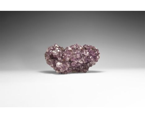 A sheet of fine pale purple amethyst crystals on a quartz base.  1.88 kg, 21.8cm (8 1/2"). From a historic ‘Victorian Museum’
