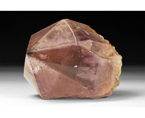 A very large pale purple crystal of amethyst in white card tray.  544 grams, 93mm (3 1/2"). From a historic ‘Victorian Museum