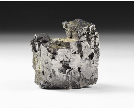 A piece of galena with interlocking and stepped cube-shaped crystals, in white card tray.  139 grams, 37mm (1 1/2"). From a h