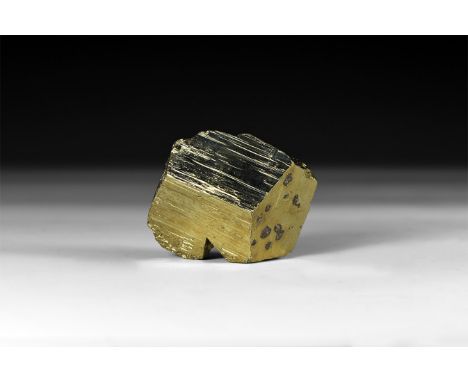 An unusual lustrous and bright yellow pyrite crystal, in white card tray with label reading: 'Pyrite, Huanaco, Peru'.  79 gra