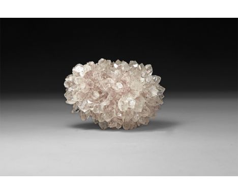 A fine, knob-shaped 'porcupine' of lilac purple amethyst crystals, in white card tray.  404 grams, 95mm (3 3/4"). From a hist