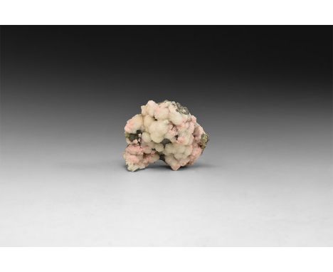 A fine specimen of pink rhodochrosite, white quartz and small pyrite crystals on galena matrix; in white card tray with label