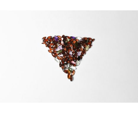 A group of one hundred and ten marquise-cut garnets, citrine, crystal, amethyst and other gem stones.  13.16 grams total, 4-8