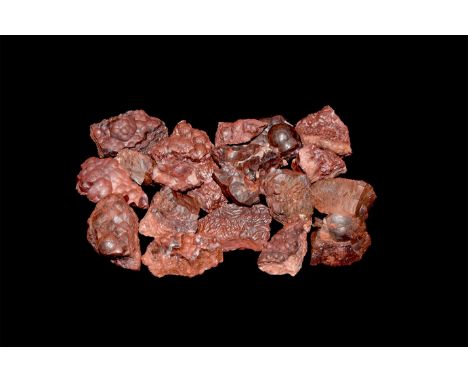 A group of twenty specimens of red hematite.  439 grams total, 26-37mm (1 - 1 1/2"). From a historic ‘Victorian Museum’ colle