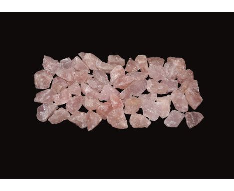 A group of fifty pale pink quartz from South Africa.  1.27 kg total, 40-51mm (1 1/2 - 2"). From a historic ‘Victorian Museum’