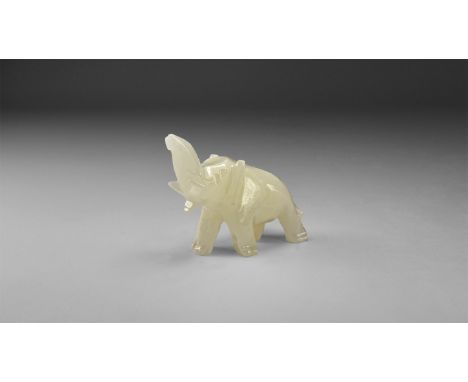 An elephant statuette carved from a white banded onyx.  129 grams, 65mm (2 1/2"). From the historic ‘Victorian Museum’ and la