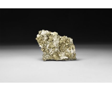 A fine specimen of white quartz crystals on a matrix of small pyritohedrons, in a white card tray with label reading: 'Quartz