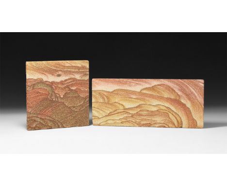 A pair of 'picture sandstone' slabs with the layers picked out in iron oxide minerals displaying the characteristic naturally