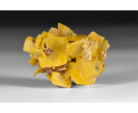 A specimen of wulfenite on matrix, in a collector's card tray.  30 grams, 37mm (1 1/2"). From a historic ‘Victorian Museum’ c