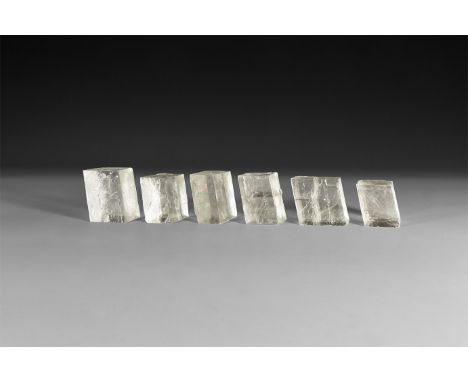 A group of six finely cut spar specimen, each in white card tray with label reading: 'Iceland Spar, Mexico'.  441 grams total
