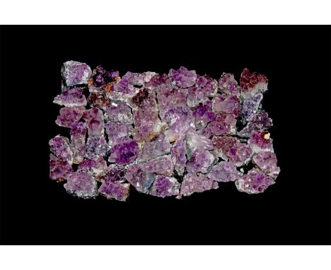 A group of fifty specimens of purple amethyst crystals on a matrix.  880 grams total, 28-42mm (1 - 1 3/4"). From a historic ‘