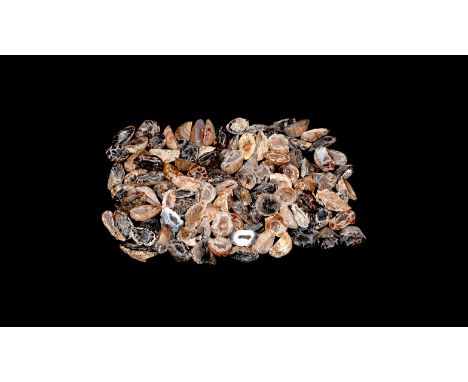 A group of one hundred cut and polished mini geode halves from Brazil.  704 grams total, 22-42mm (1 - 1 3/4"). From a histori