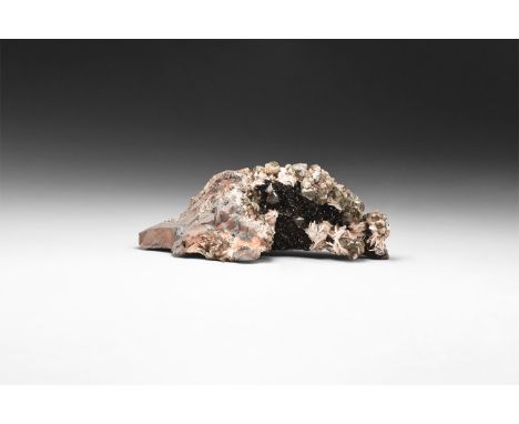 A fine specimen of specular hematite with pink dolomite crystals.  476 grams, 14.3cm (5 1/2"). From a historic ‘Victorian Mus