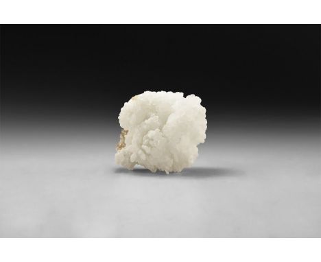 A fine specimen of a white calcite minerals cluster.  395 grams, 10.6cm (4 1/4"). From a historic ‘Victorian Museum’ collecti