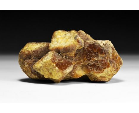 A very large fine formation of dark yellow grossular garnet crystals, in white card tray.  372 grams, 94mm (3 3/4"). From a h